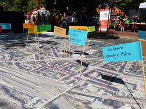 Luftbild von der Nordstadt mit kleine Fähnchen mit Ideen von Bürgerinnen und Bürgern